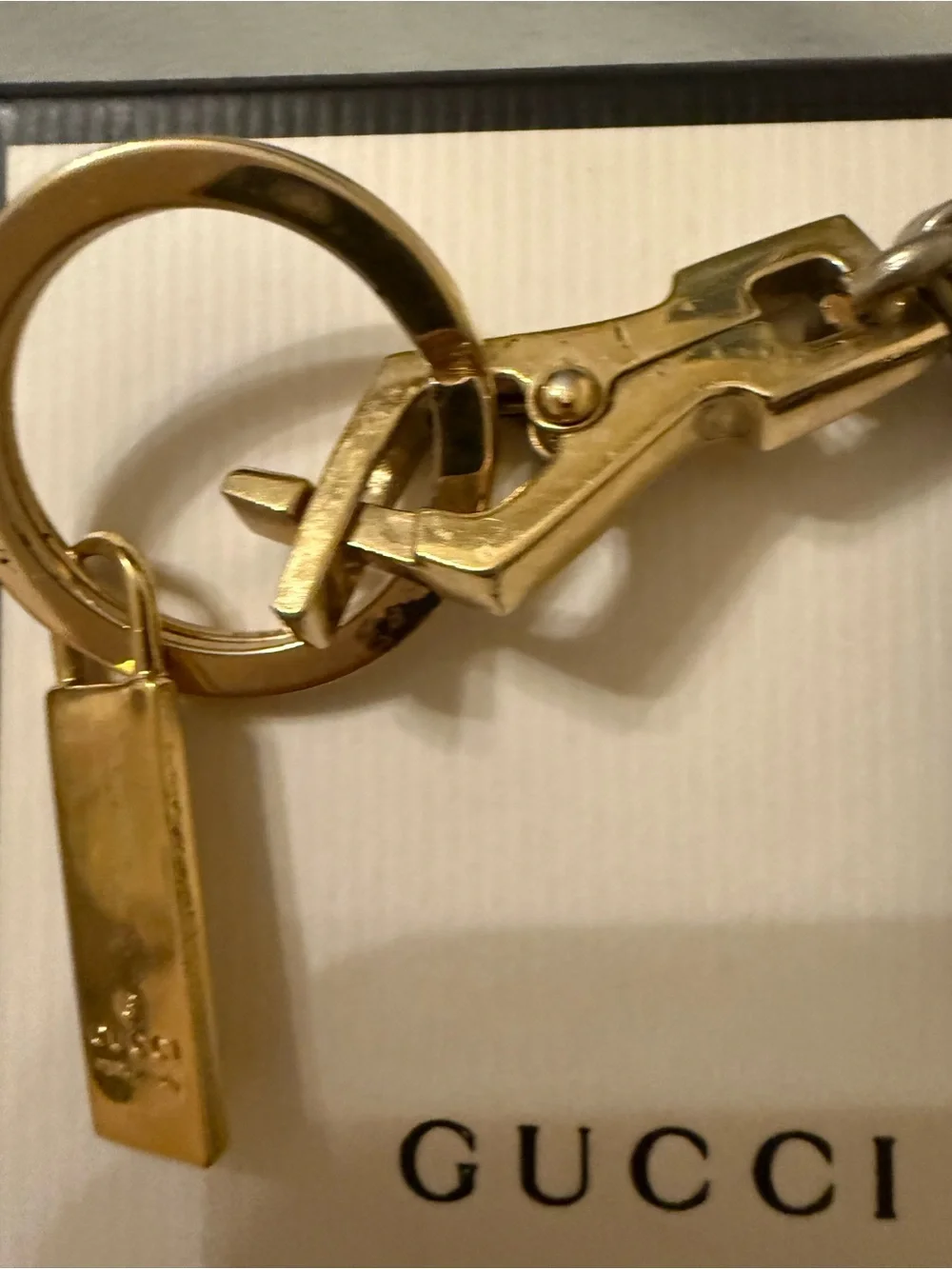 Gucci Plus mixed metal and red enamel keychain